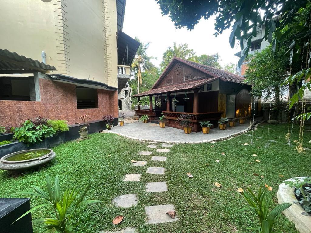 Kalpadiyil Hotel Balarampuram Exterior photo